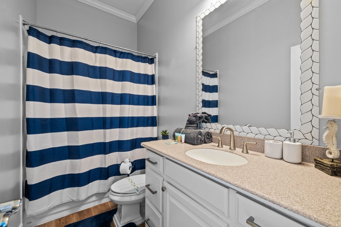 522 Dolphin Drive Freeport, TX 77541 - Photo 10 of 47 a bathroom with a sink toilet and shower