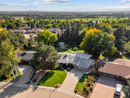 an aerial view of a house with a garden