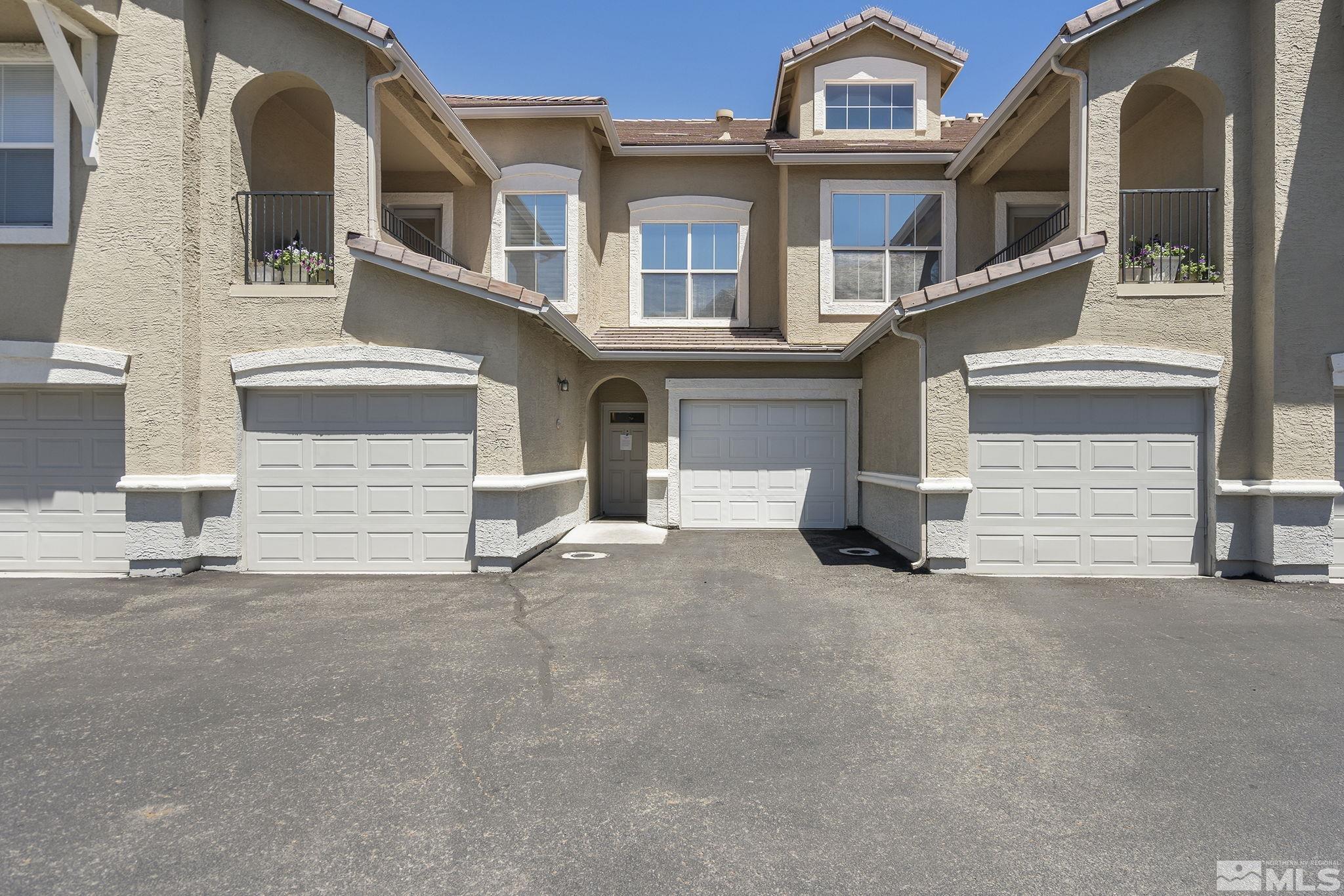 9050 Double R Boulevard, Unit 1622 Reno, NV 89511 - Photo 1 of 25 a view of a building with a street