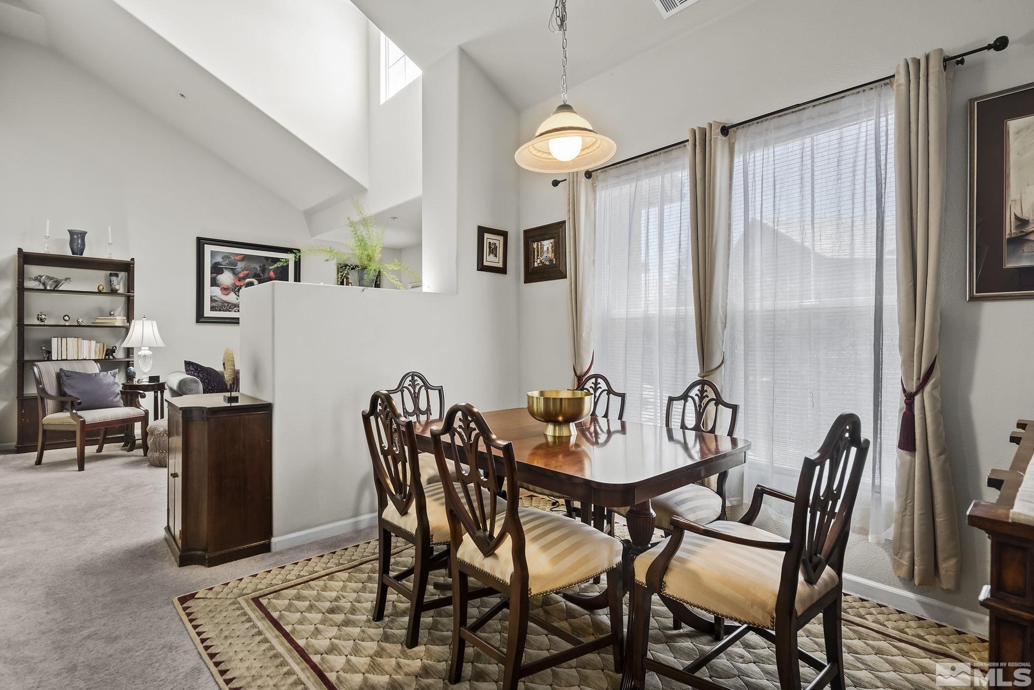 9050 Double R Boulevard, Unit 1622 Reno, NV 89511 - Photo 11 of 25 a view of a dining room with furniture