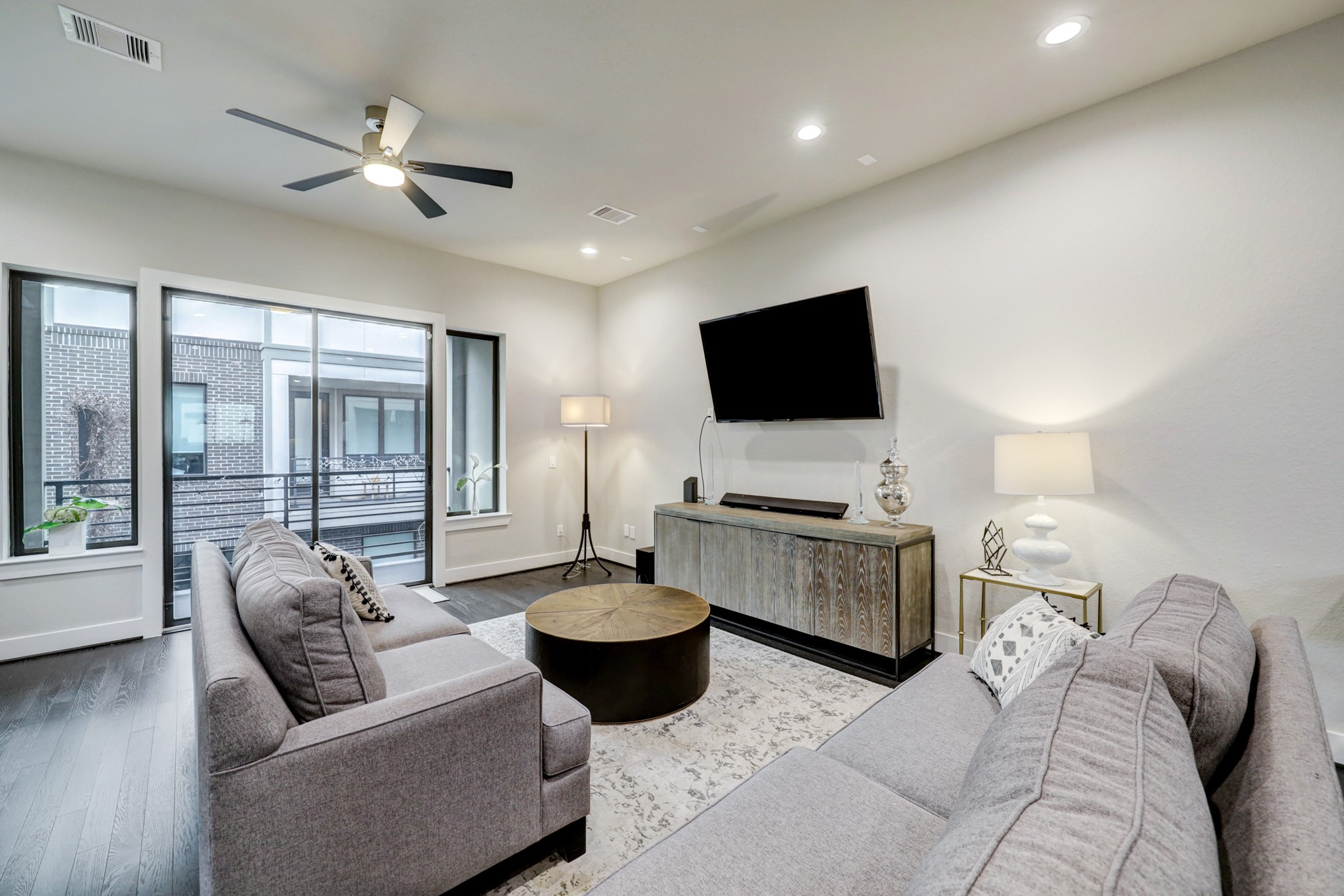 4203 Allen Street Houston, TX 77007 - Photo 9 of 35 a living room with furniture and a flat screen tv