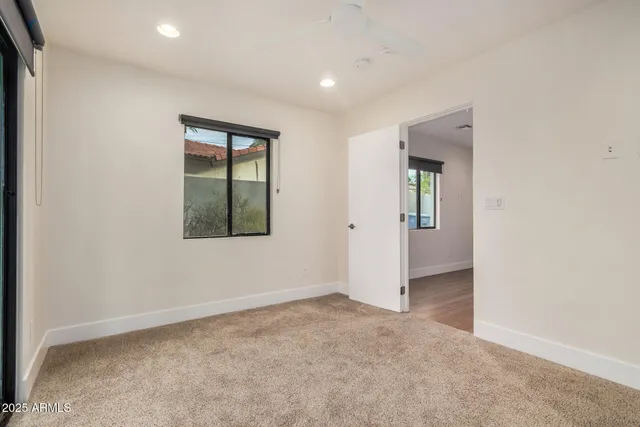 an empty room with windows