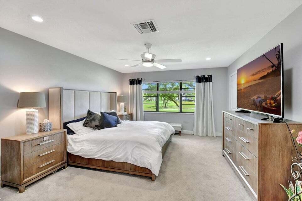 15 Westgate Lane, Unit D Boynton Beach, FL 33436 - Photo 17 of 58 Primary Bedroom