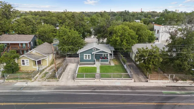 a view of a house with a sink and yard