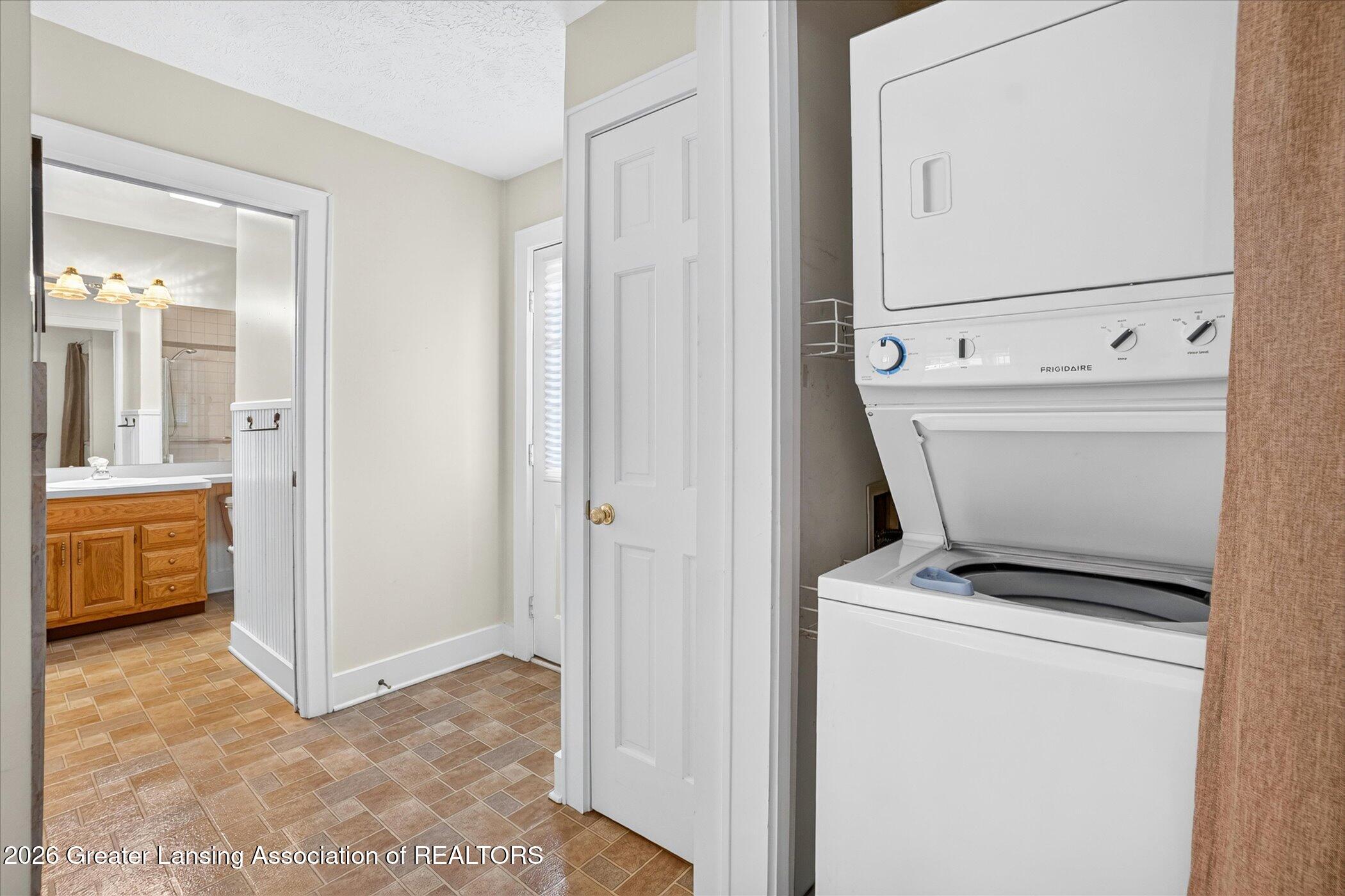 1716 Tecumseh River Road Lansing, MI 48906 - Photo 21 of 51 First Floor Laundry