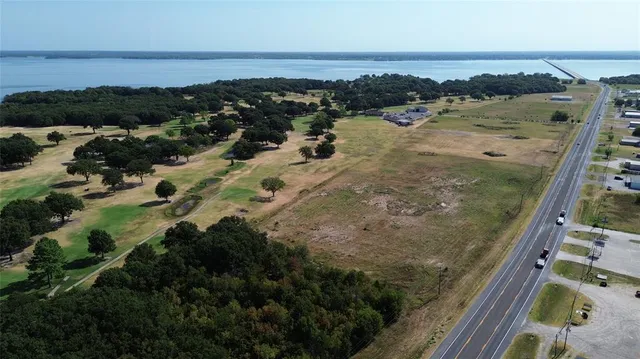 a view of a lake from a balcony