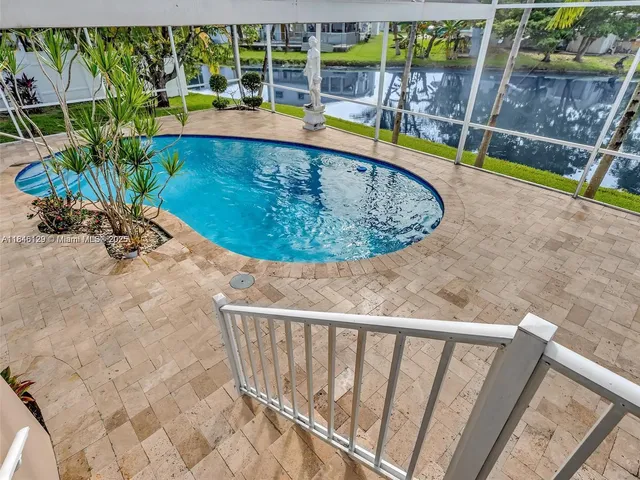 a view of a hallway view with staircase