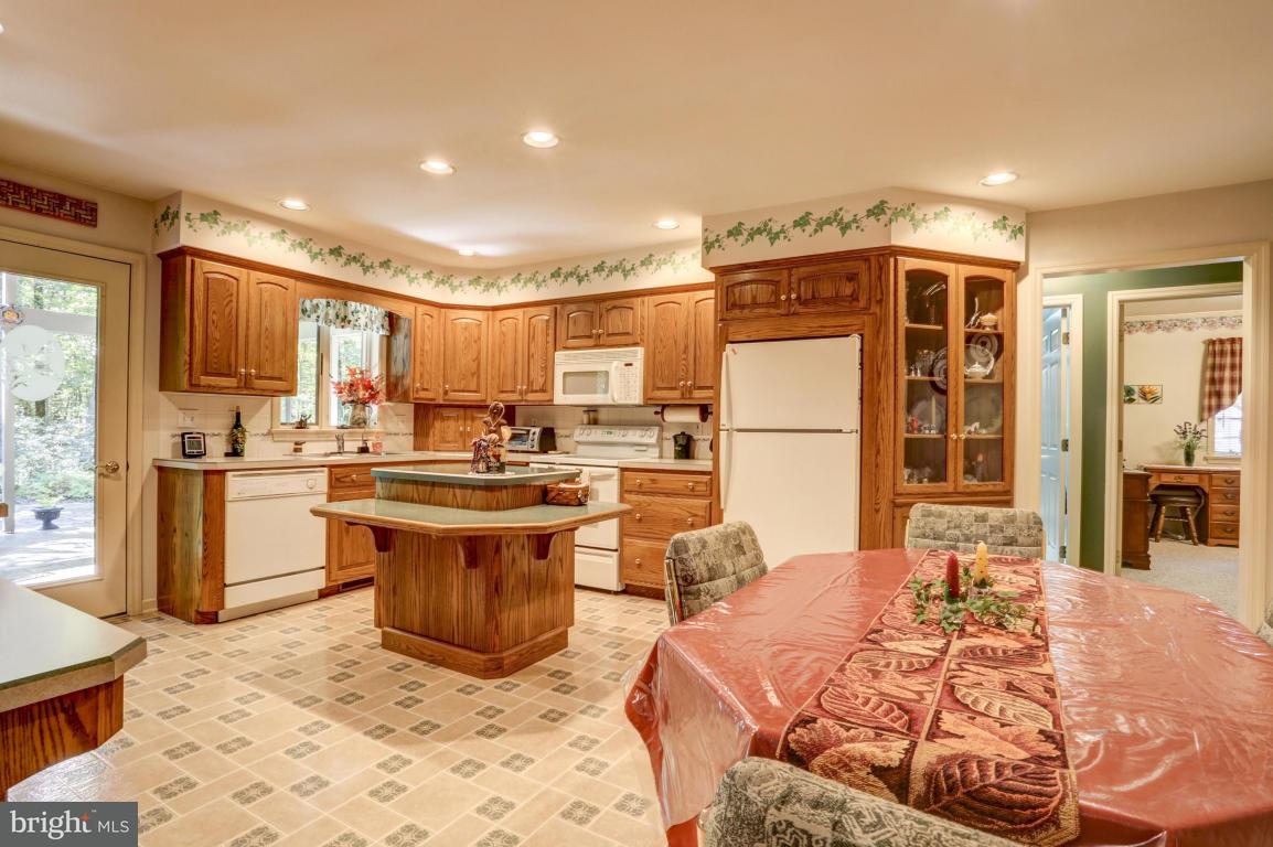 1136 Ranck Road New Holland, PA 17557 - Photo 12 of 37 a kitchen with a refrigerator and a sink
