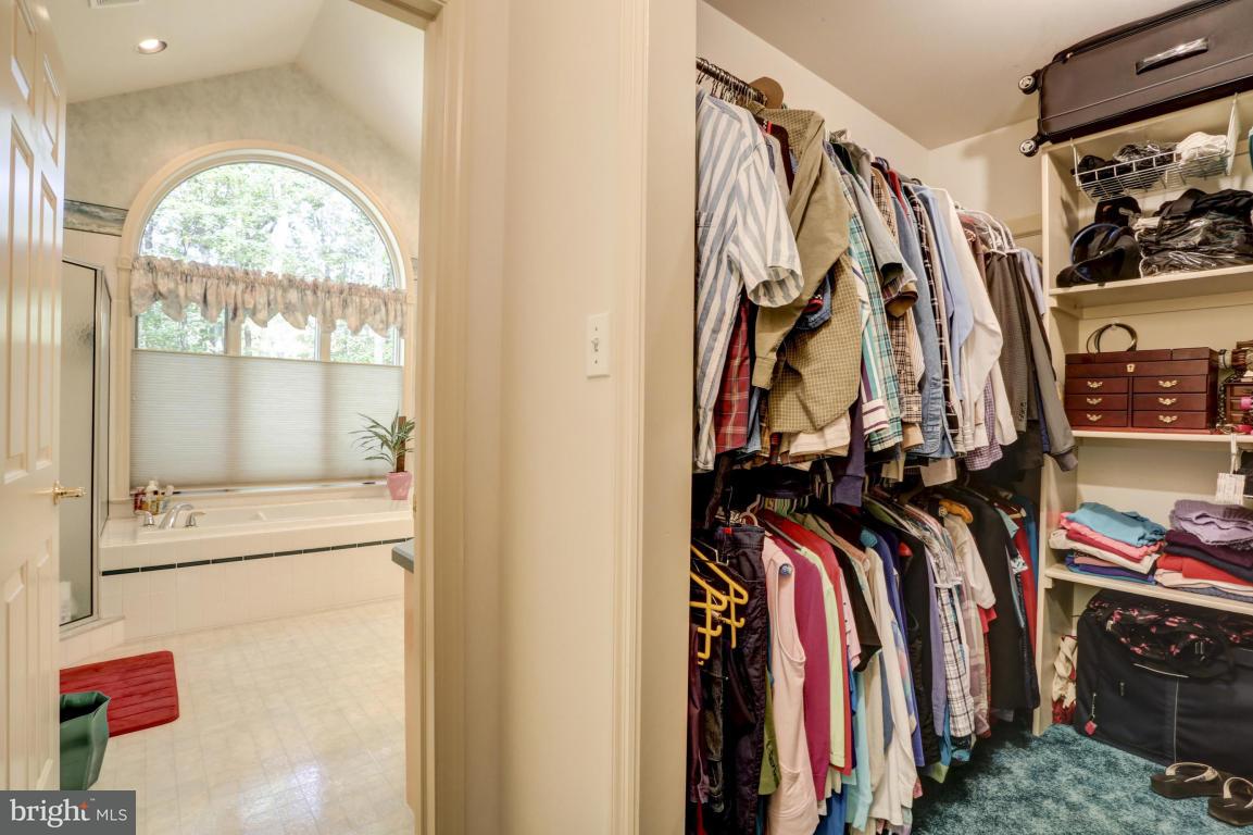 1136 Ranck Road New Holland, PA 17557 - Photo 18 of 37 a view of walk in closet with clothes and shoes