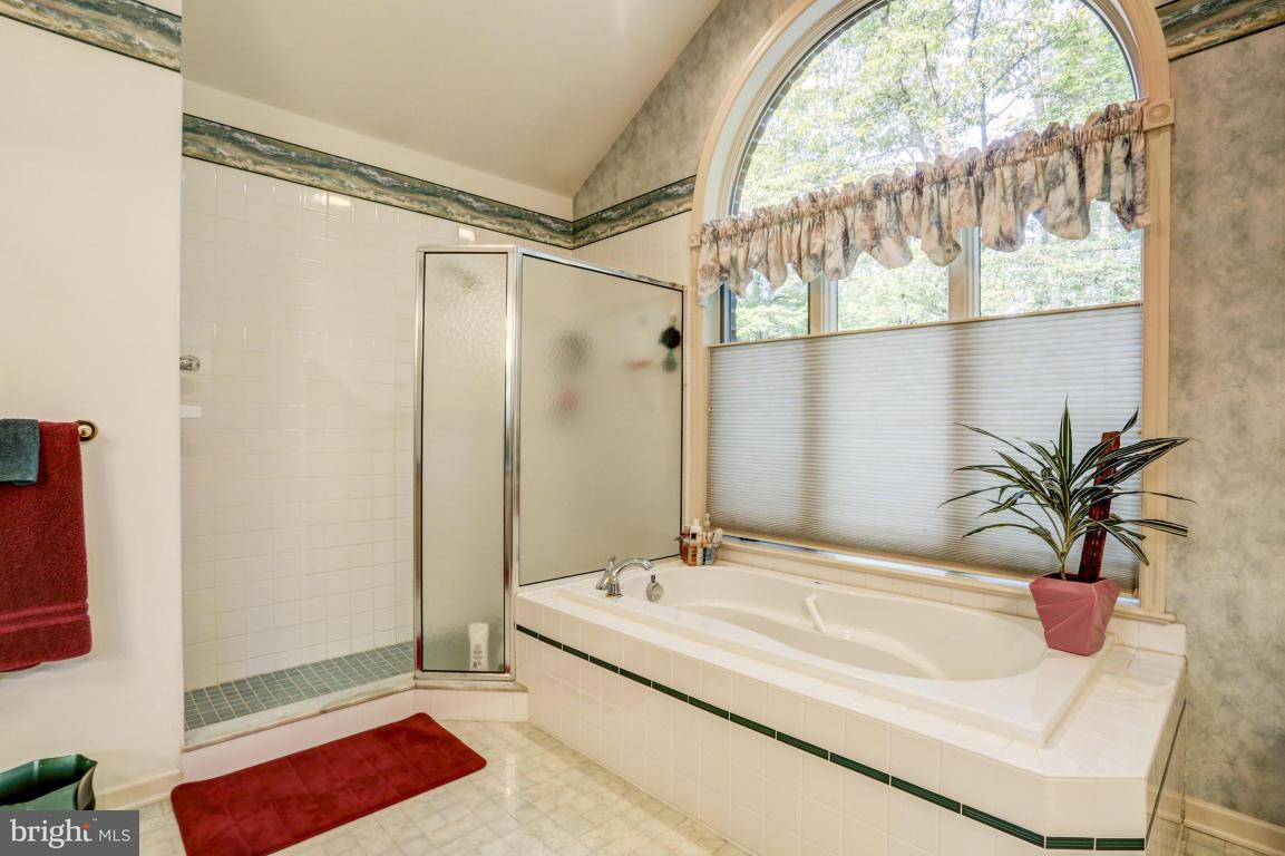 1136 Ranck Road New Holland, PA 17557 - Photo 21 of 37 a bathroom with a granite countertop sink and a mirror