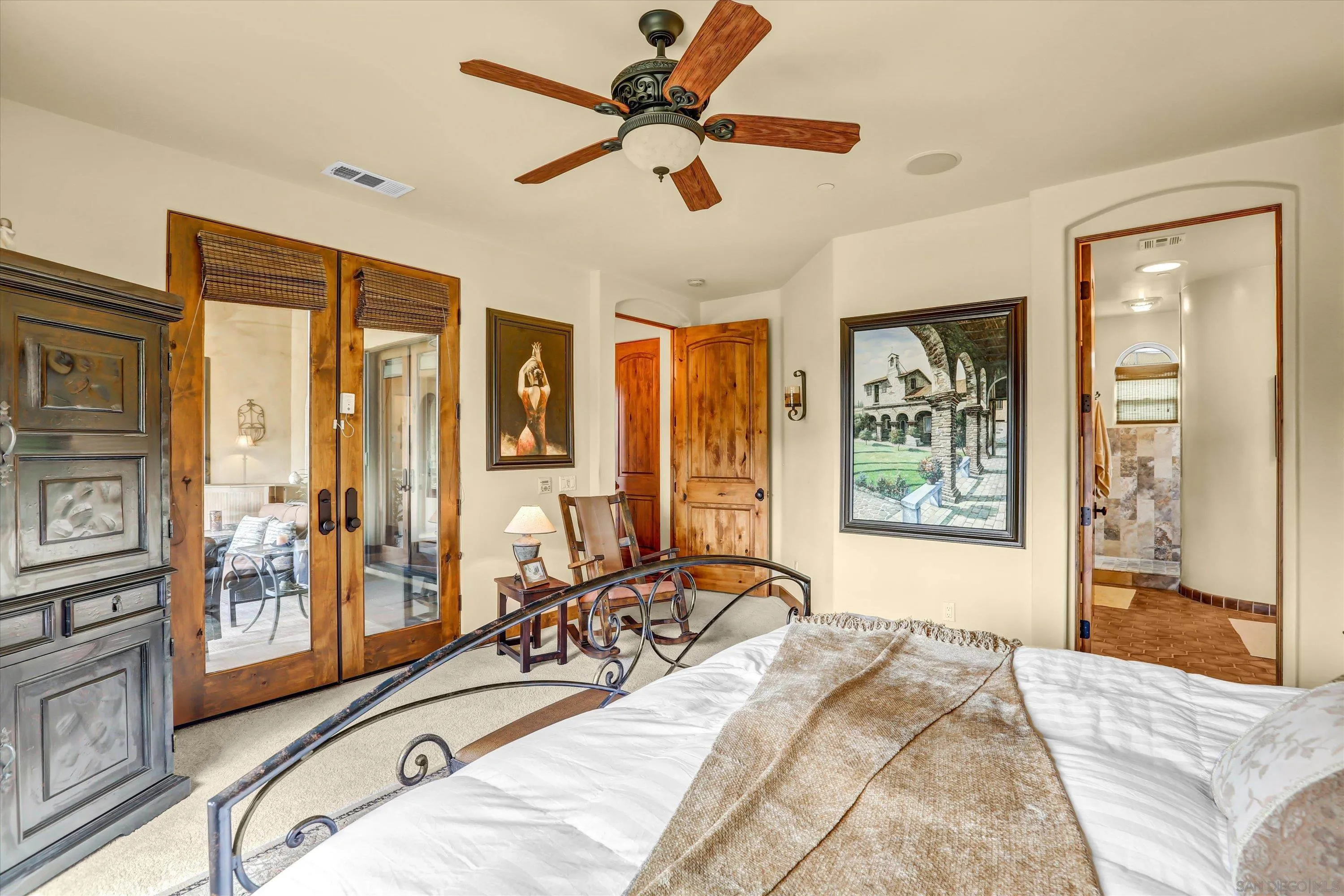 584 South Grade Road Alpine, CA 91901 - Photo 26 of 39 a bed sitting in a spacious bedroom next to a window