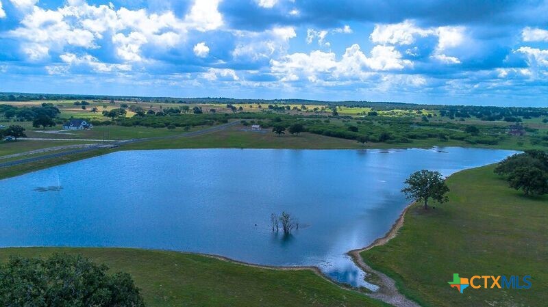 Tbd Flash Circle Luling, TX 78648 - Photo 3 of 4 an aerial view of a golf course with a lake view