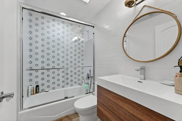 a view of a livingroom with furniture and wooden floor