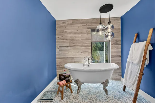 a view of swimming pool with seating space