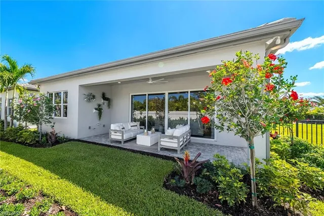 a house view with a sitting space and garden space