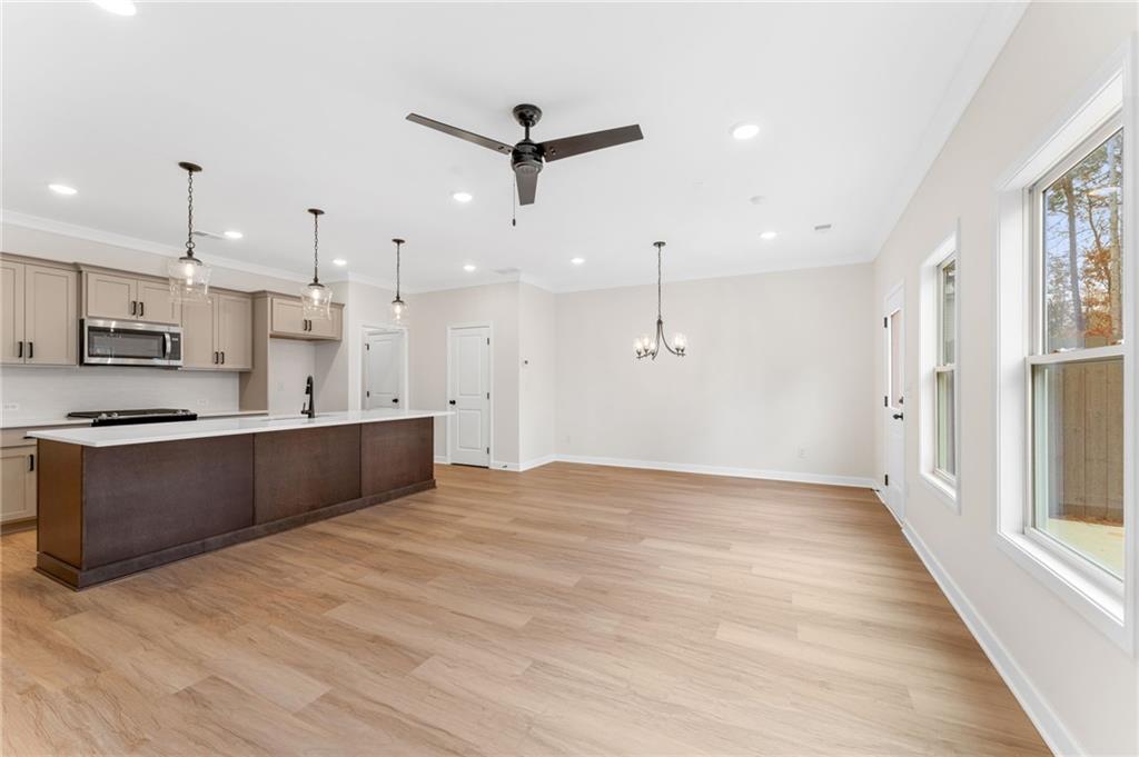 340 Colsen Drive Acworth, GA 30102 - Photo 13 of 25 a large kitchen with a lot of counter space wooden floor and appliances