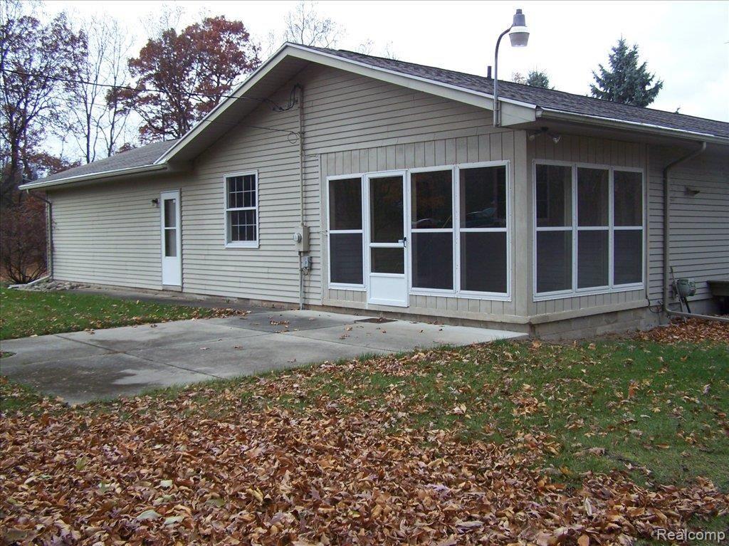 3300 Norton Road Howell, MI 48843 - Photo 11 of 18 EXTERIOR VIEW OF 3 SEASON ROOM