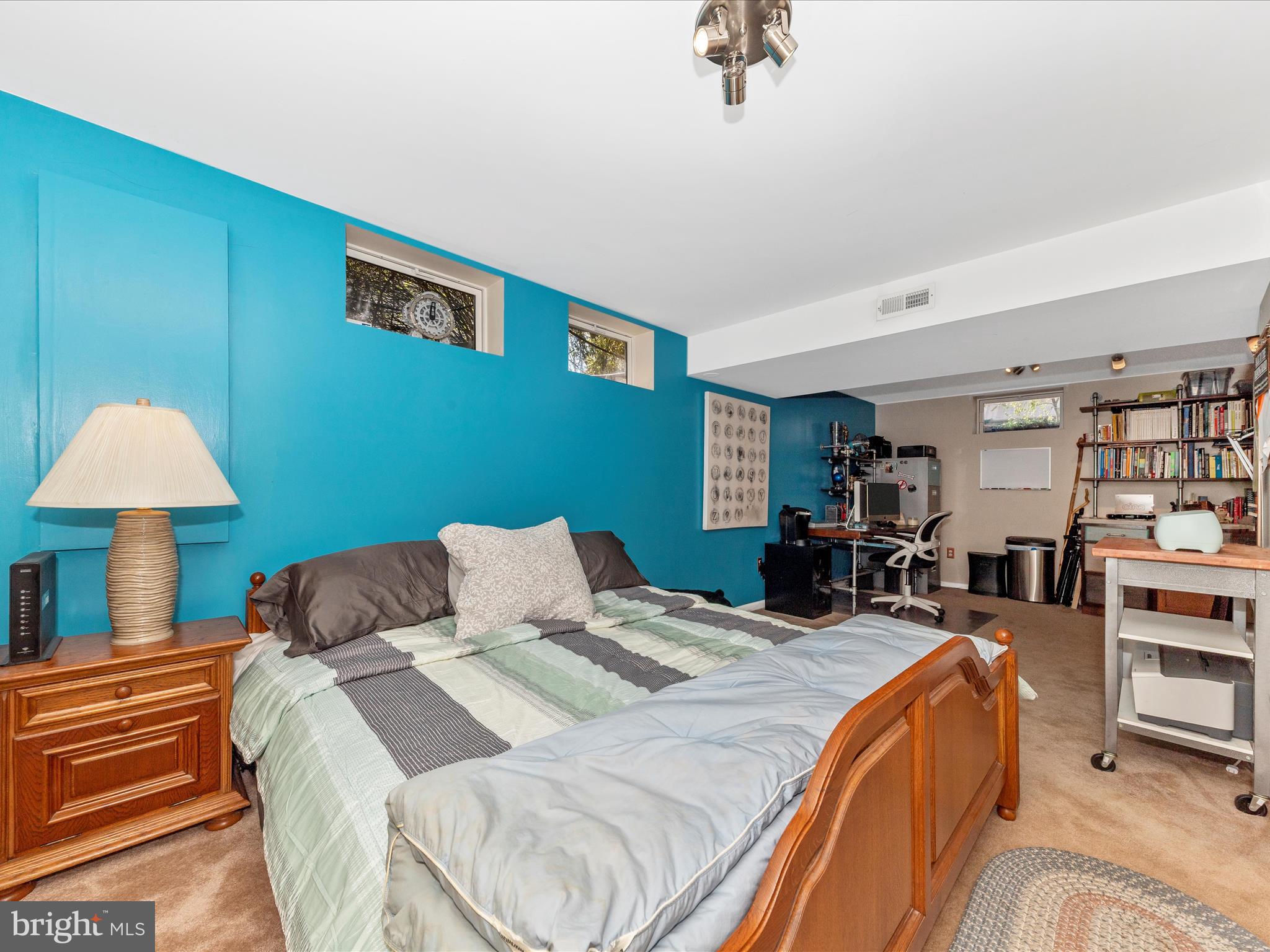 2406 Graystone Lane Frederick, MD 21702 - Photo 35 of 62 a bed room with a bed and a chair