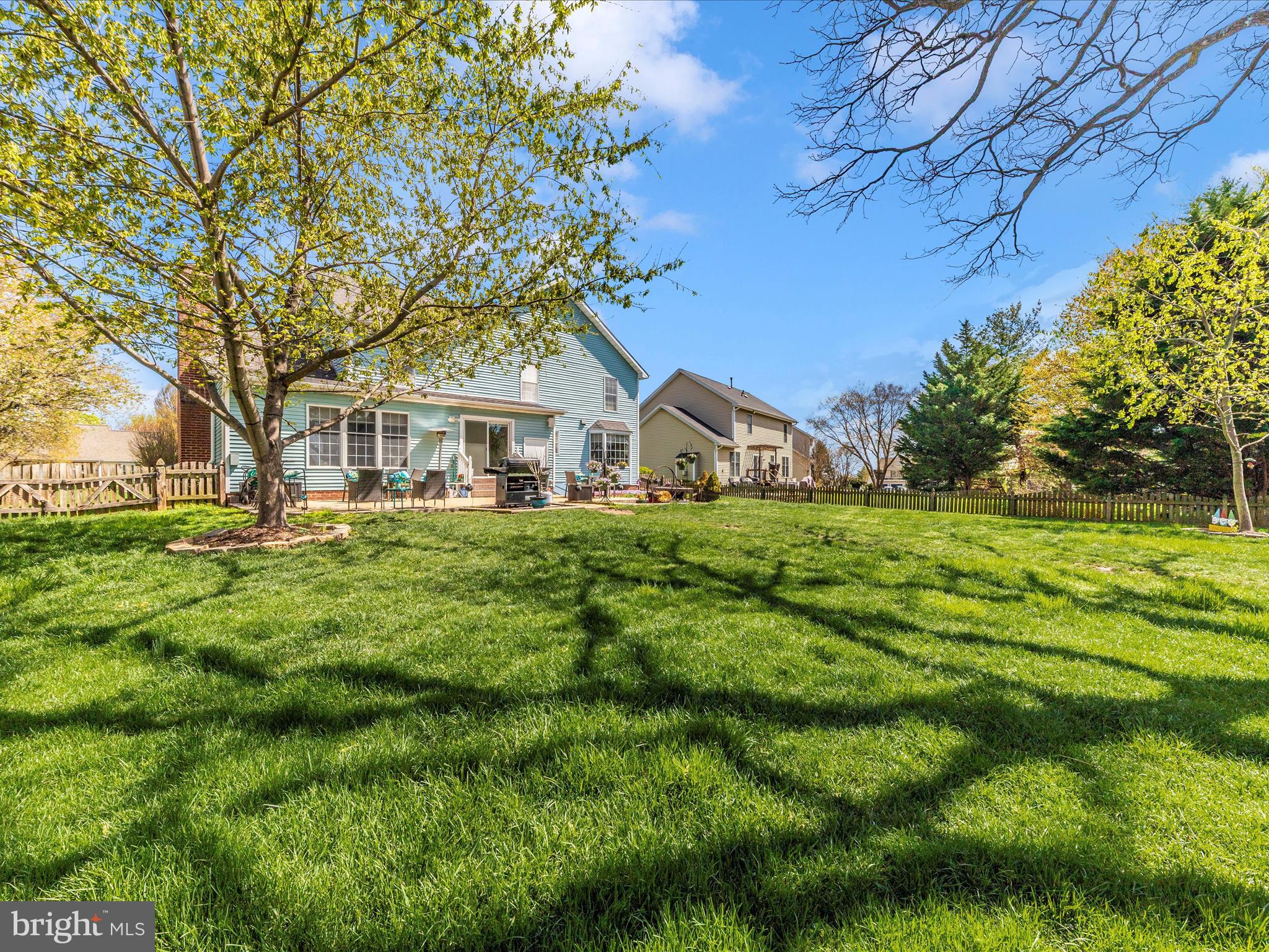 2406 Graystone Lane Frederick, MD 21702 - Photo 46 of 62 a front view of a house with garden