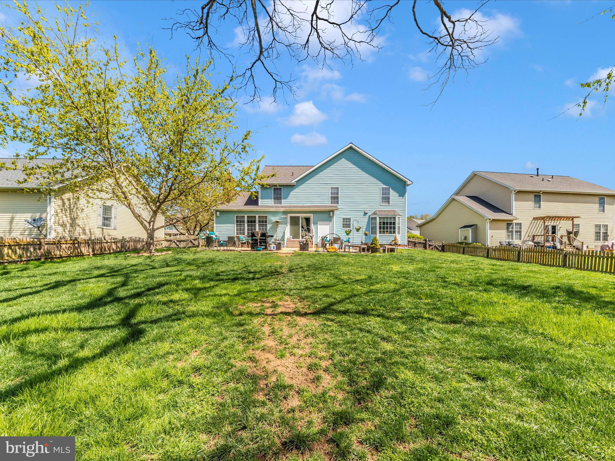 2406 Graystone Lane Frederick, MD 21702 - Photo 47 of 62 a front view of a house with a yard