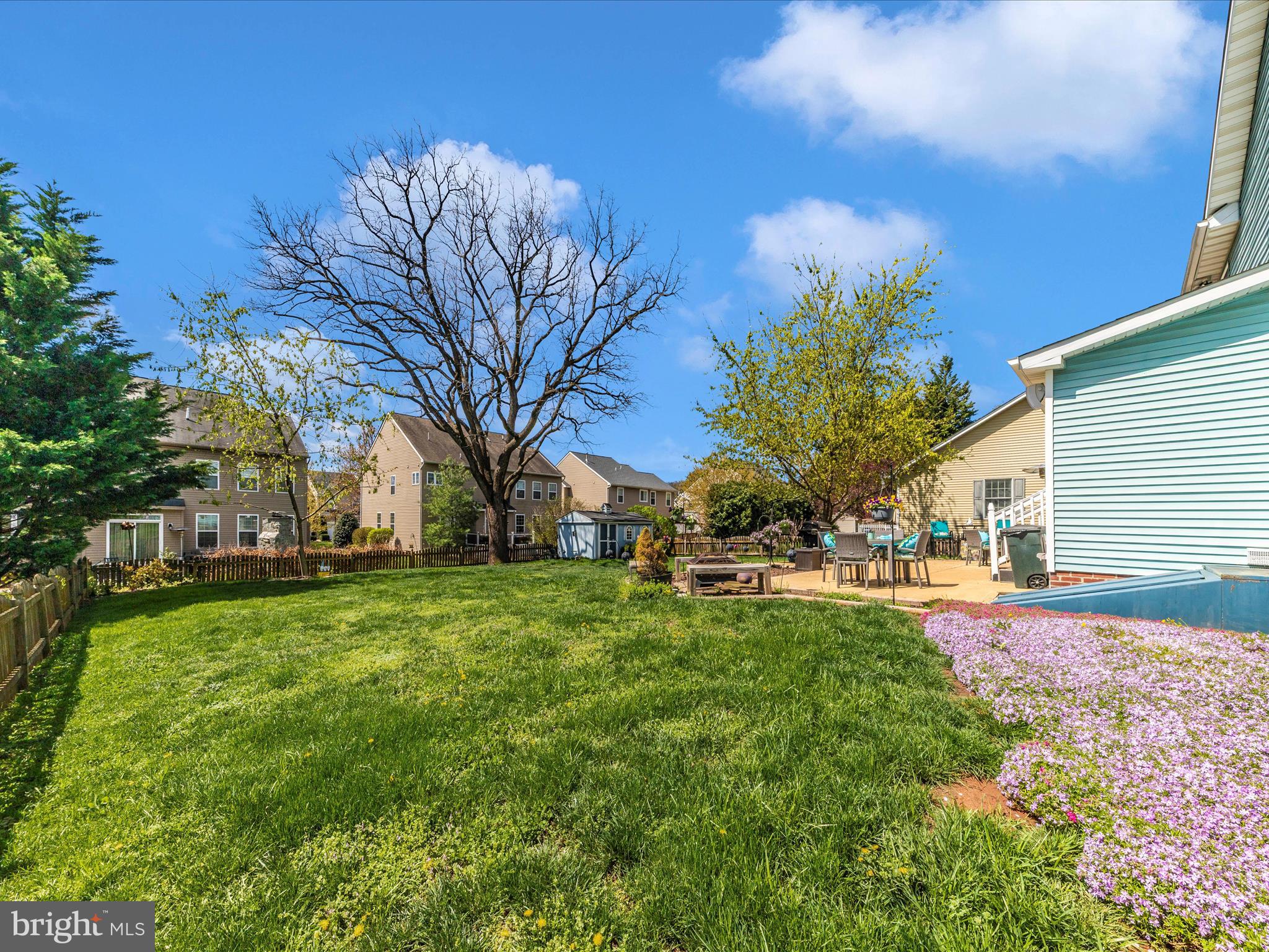 2406 Graystone Lane Frederick, MD 21702 - Photo 49 of 62 a view of a house with a yard