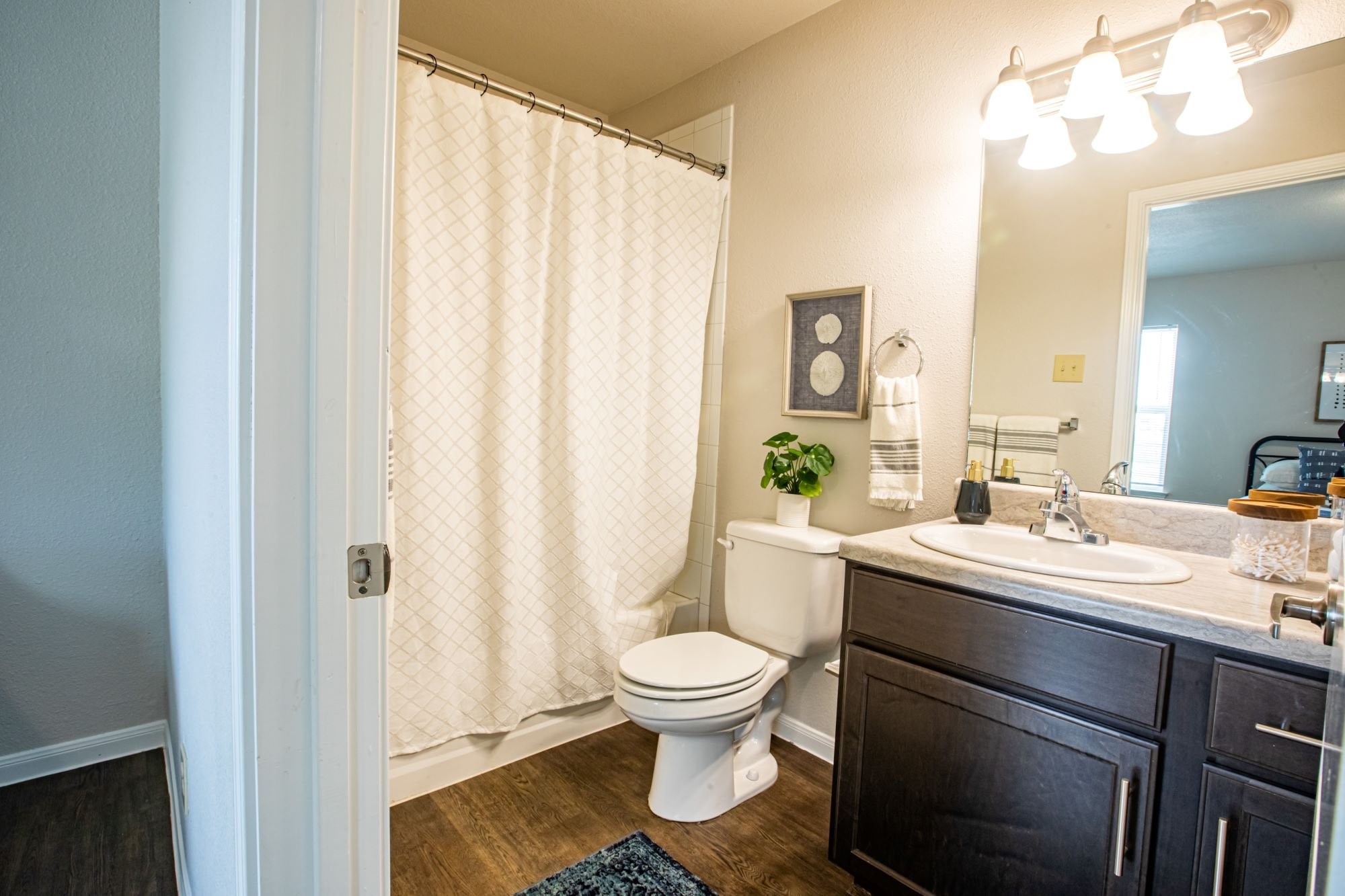 2008 Sam Houston Drive Victoria, TX 77901 - Photo 29 of 29 a bathroom with a sink a toilet and a mirror