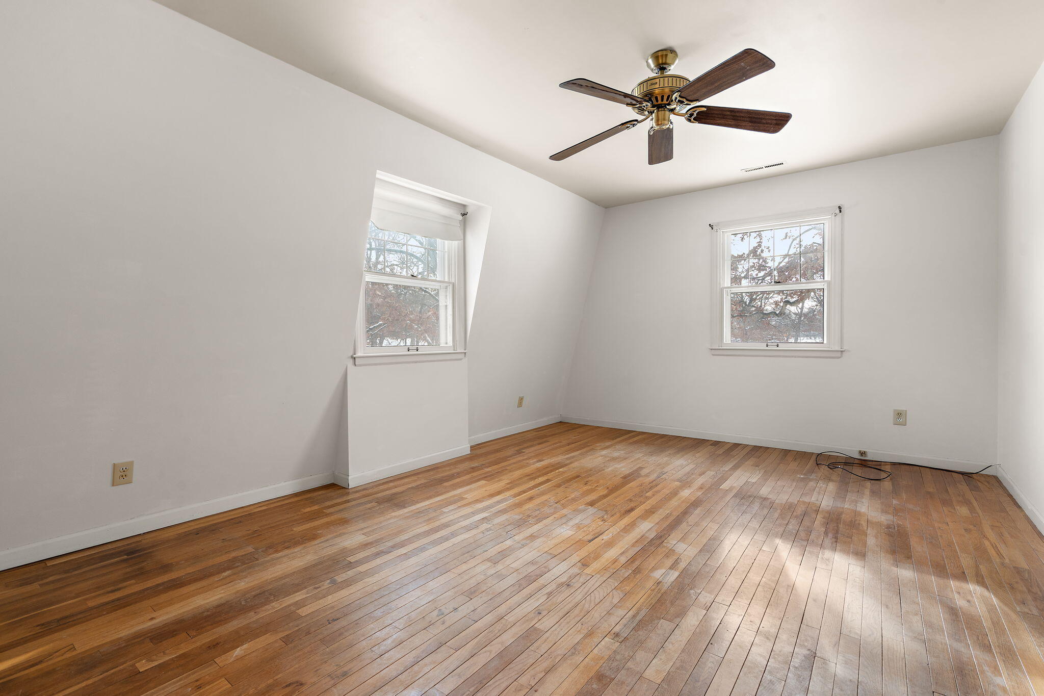 12322 Alexander Street Cedar Lake, IN 46303 - Photo 15 of 21 an empty room with wooden floor and windows