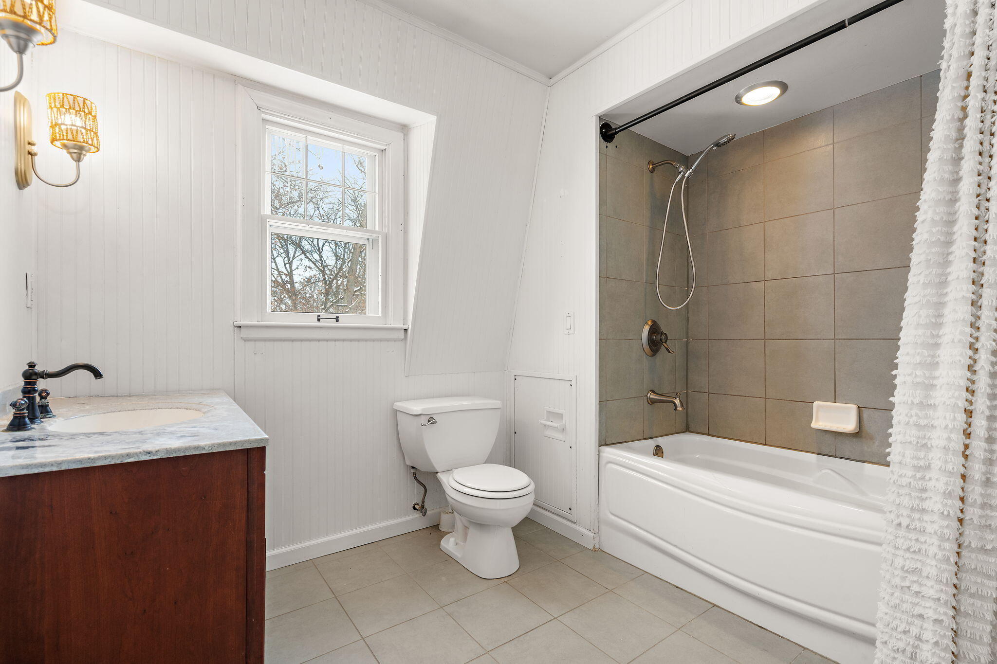 12322 Alexander Street Cedar Lake, IN 46303 - Photo 10 of 21 a bathroom with a granite countertop toilet a sink and a bathtub