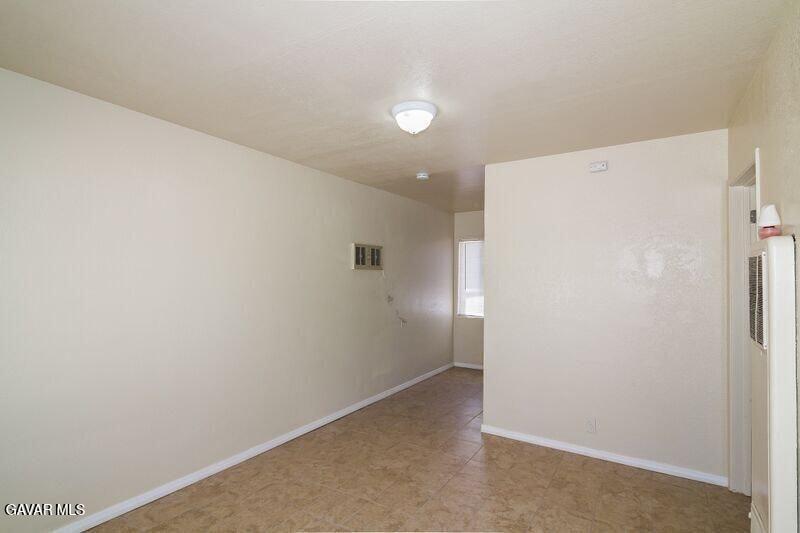 2618 Desert Street, Unit 11 Rosamond, CA 93560 - Photo 5 of 8 a view of a hallway