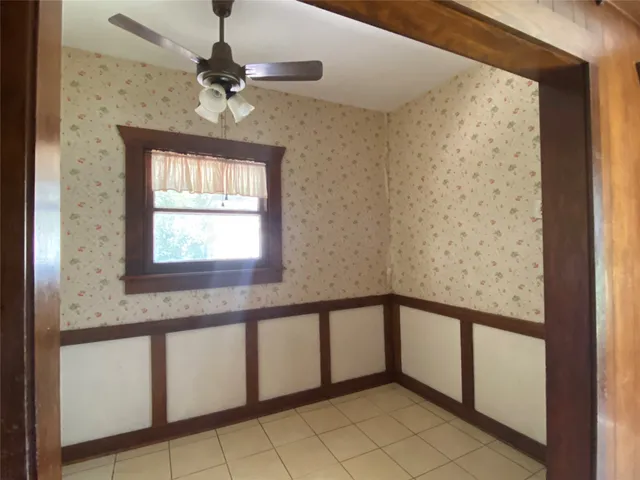 a view of a hallway with a window