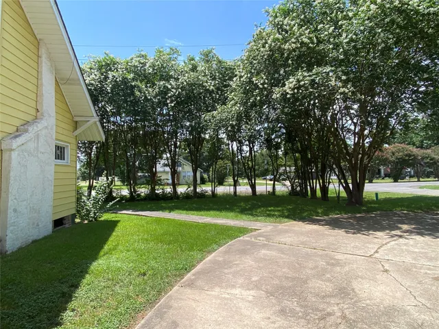 a view of a backyard with a garden