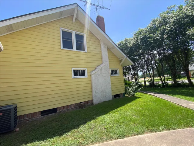 a view of a backyard with a garden