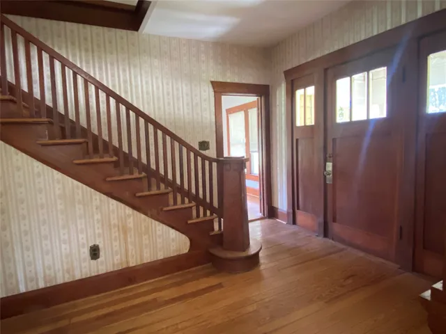 a view of a hallway with staircase