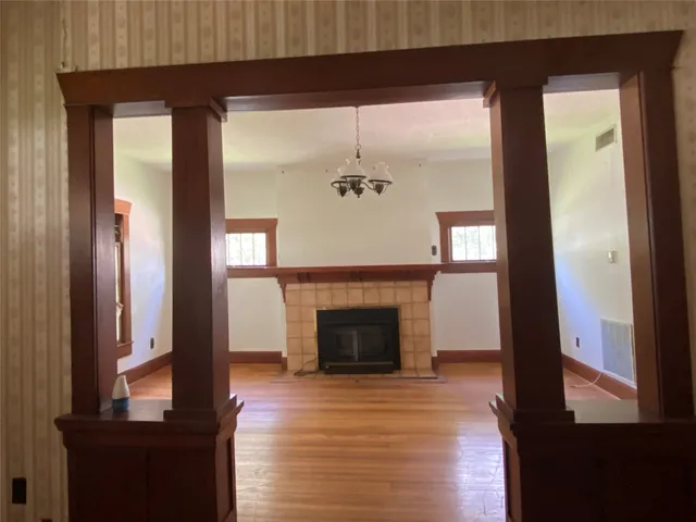 a view of an entryway with a fireplace