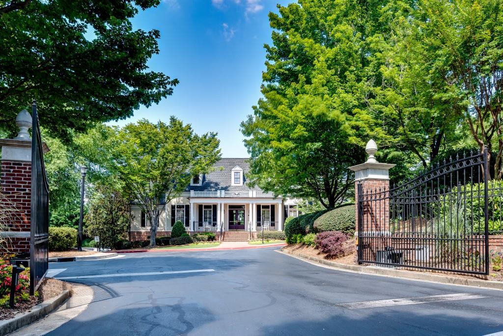 4805 Ivy Ridge Drive Southeast, Unit 305 Atlanta, GA 30339 - Photo 1 of 1 a front view of a house with a porch