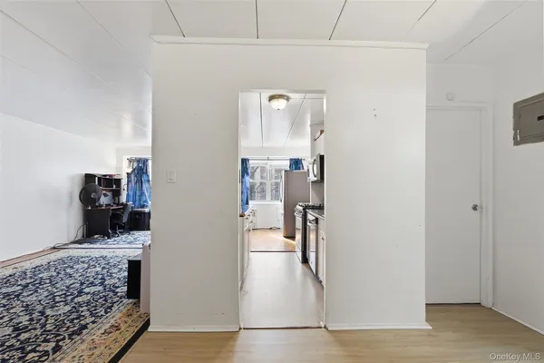 a bathroom with a sink a toilet and shower curtain