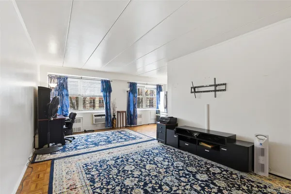 a workspace with furniture and rug