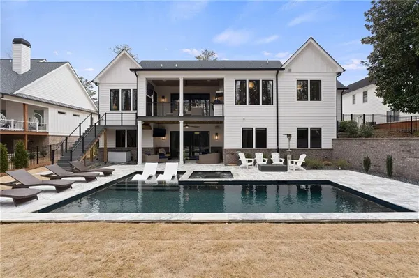 a front view of a house with swimming pool