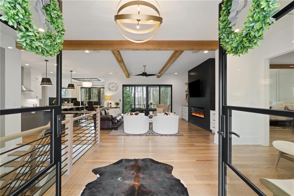 4226 South Berkeley Lake Road Northwest Berkeley Lake, GA 30096 - Photo 2 of 61 view of living room and dining room