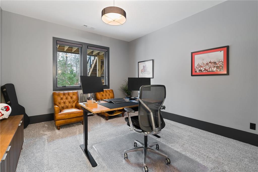 4226 South Berkeley Lake Road Northwest Berkeley Lake, GA 30096 - Photo 31 of 61 a work room with furniture and windows