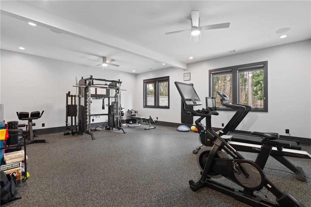 4226 South Berkeley Lake Road Northwest Berkeley Lake, GA 30096 - Photo 33 of 61 a view of a room with gym equipment