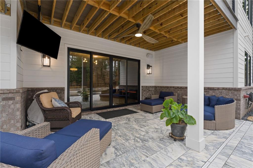 4226 South Berkeley Lake Road Northwest Berkeley Lake, GA 30096 - Photo 39 of 61 a lobby with furniture and potted plants
