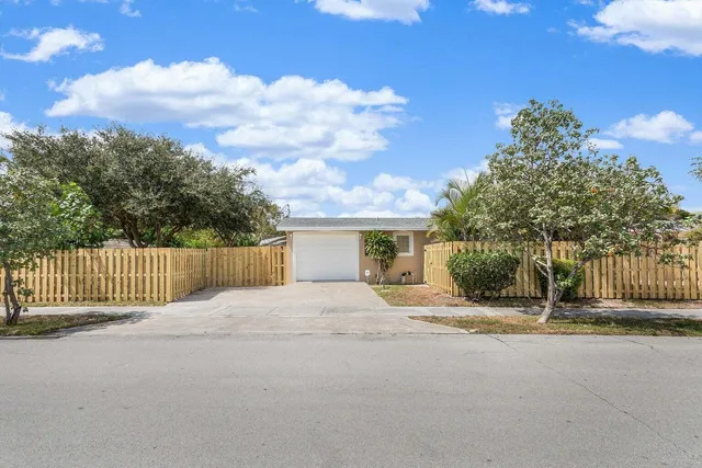 a view of backyard of a house