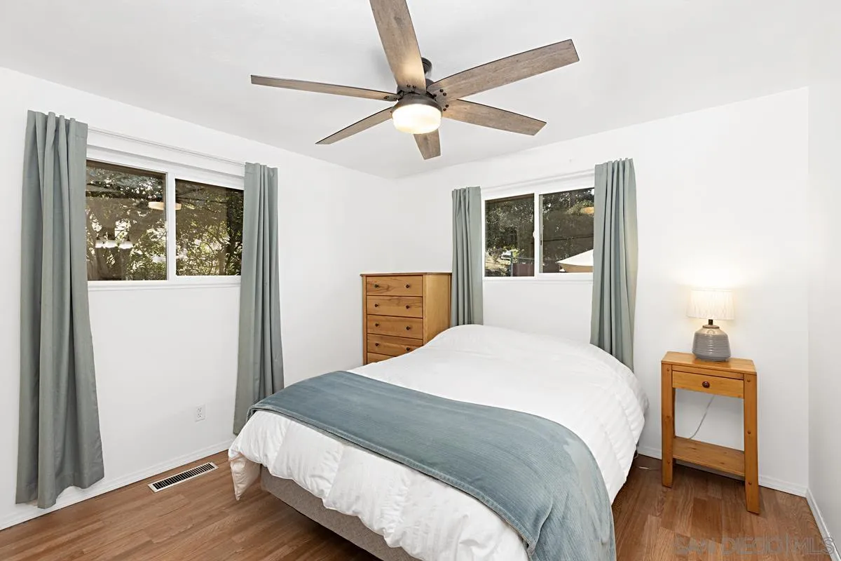 9147 Rosedale Drive Spring Valley, CA 91977 - Photo 19 of 44 a bedroom with a bed and a window