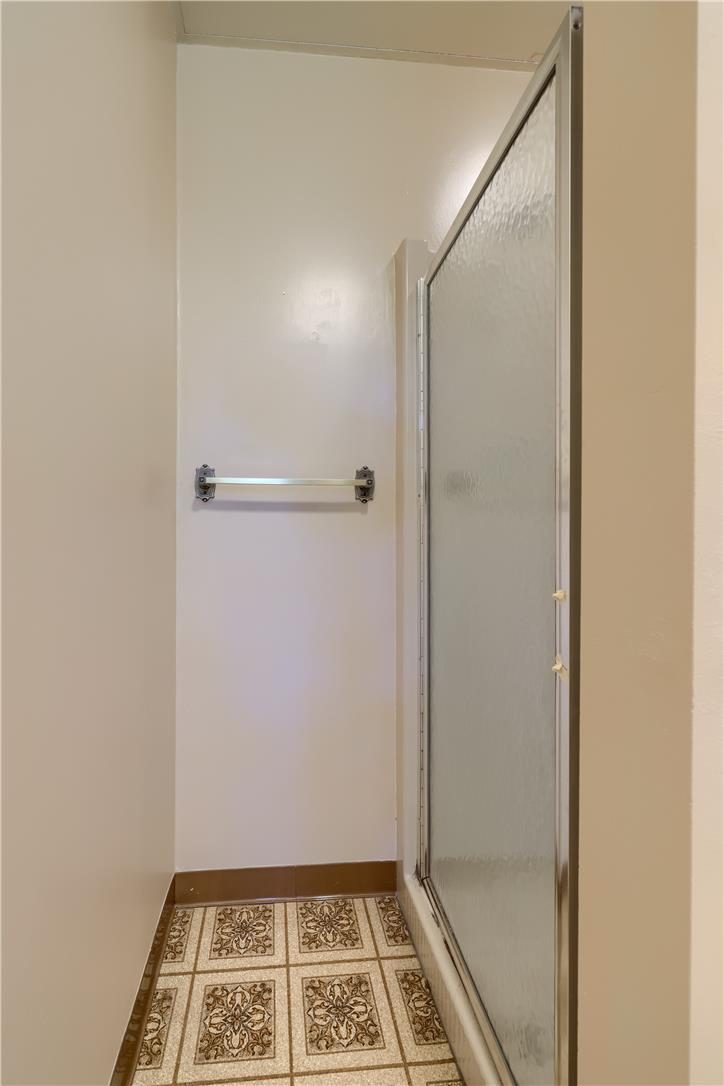 Coldsprings Rd Union Pottstown, PA 19465 - Photo 64 of 71 Functional shower space features a glass enclosure and practical tile flooring.