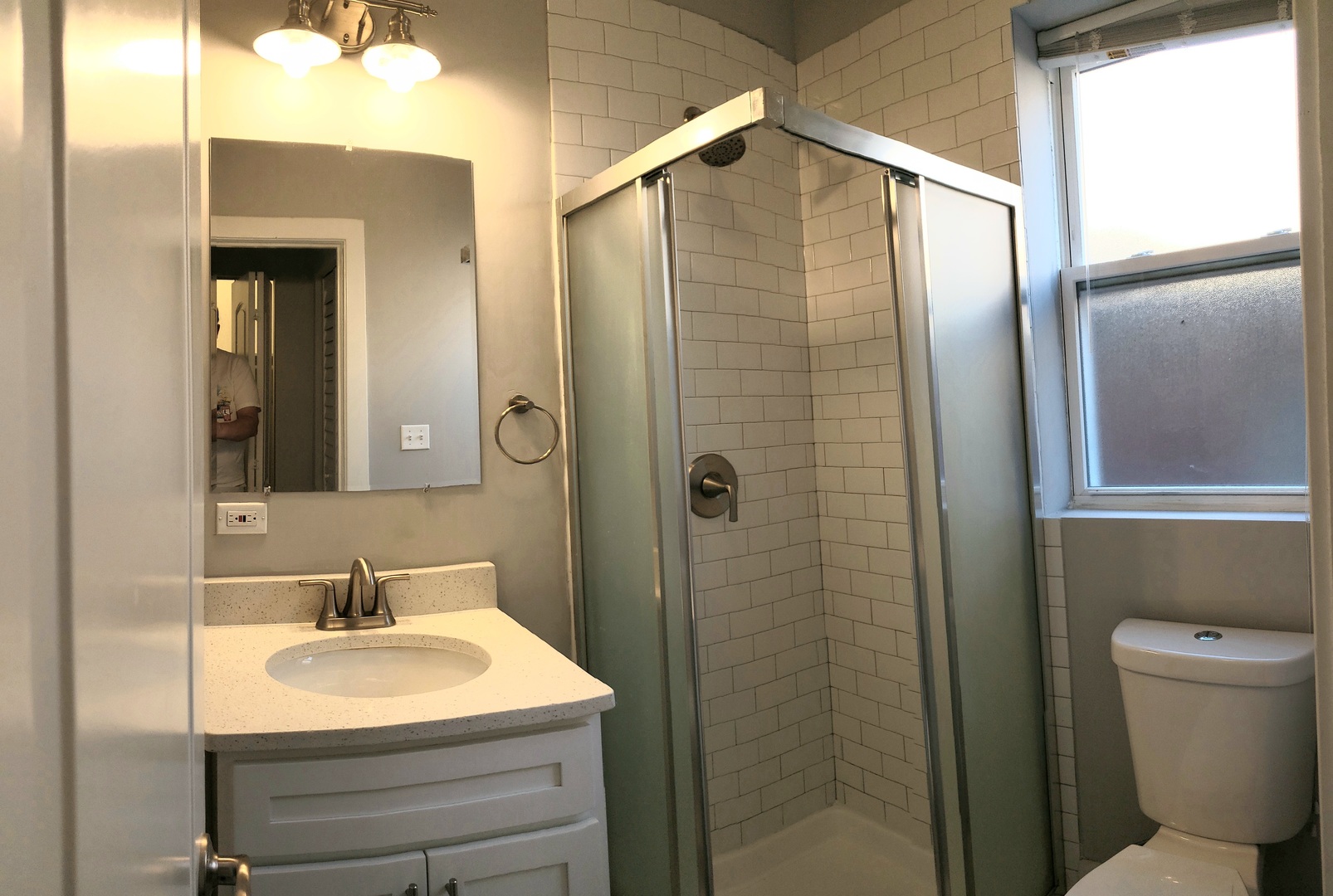 2030 West 21st Street Chicago, IL 60608 - Photo 11 of 19 a bathroom with a sink toilet and shower