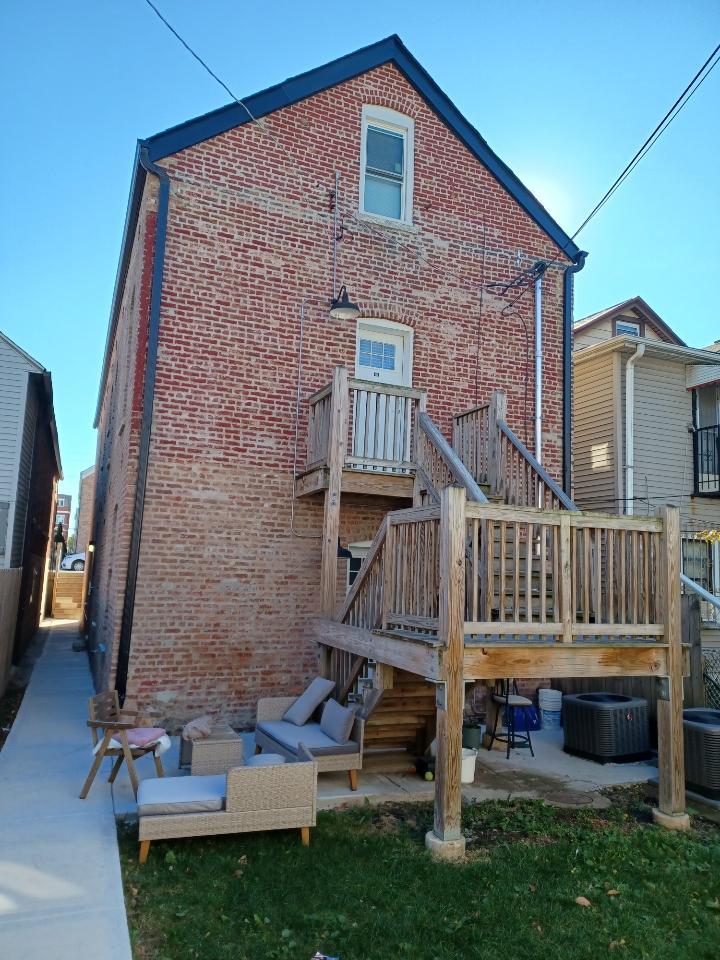 2030 West 21st Street Chicago, IL 60608 - Photo 13 of 19 a view of front of a house with a yard