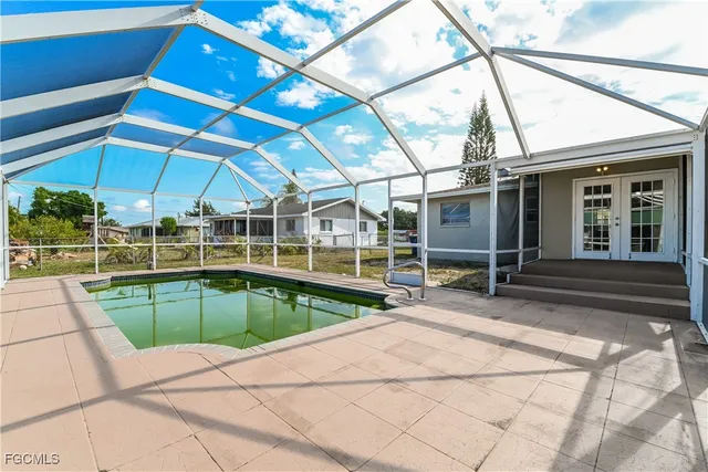 a view of a house with a swimming pool