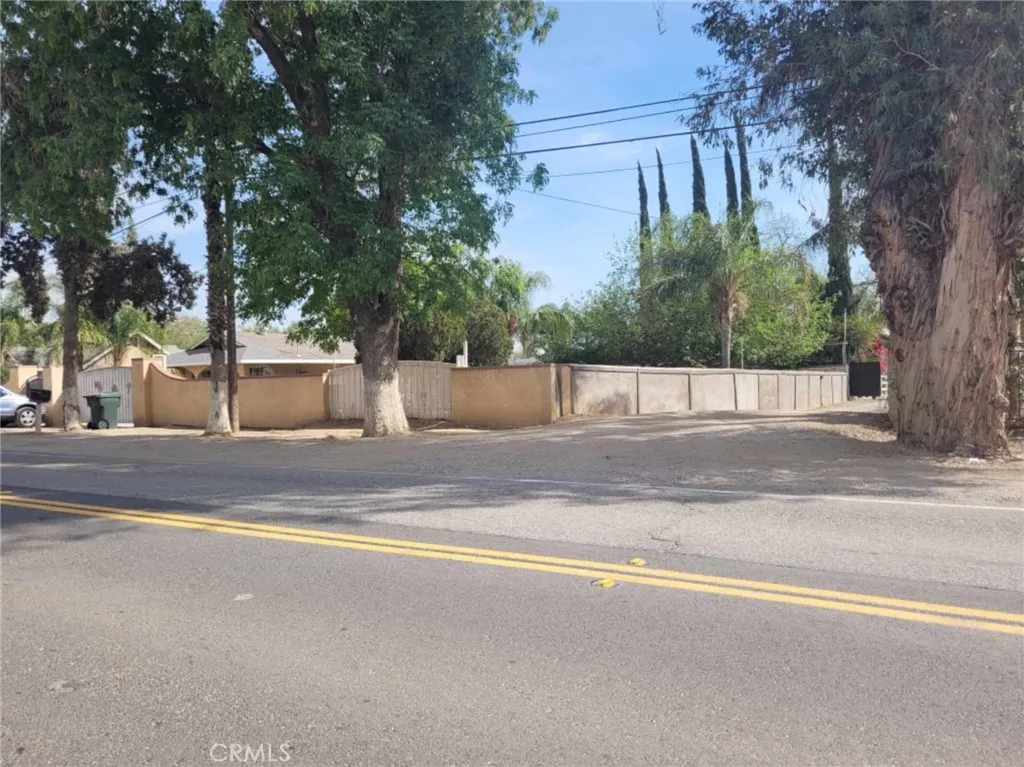 5258 El Rivino Road Jurupa Valley, CA 92509 - Photo 3 of 4 a view of street with large trees