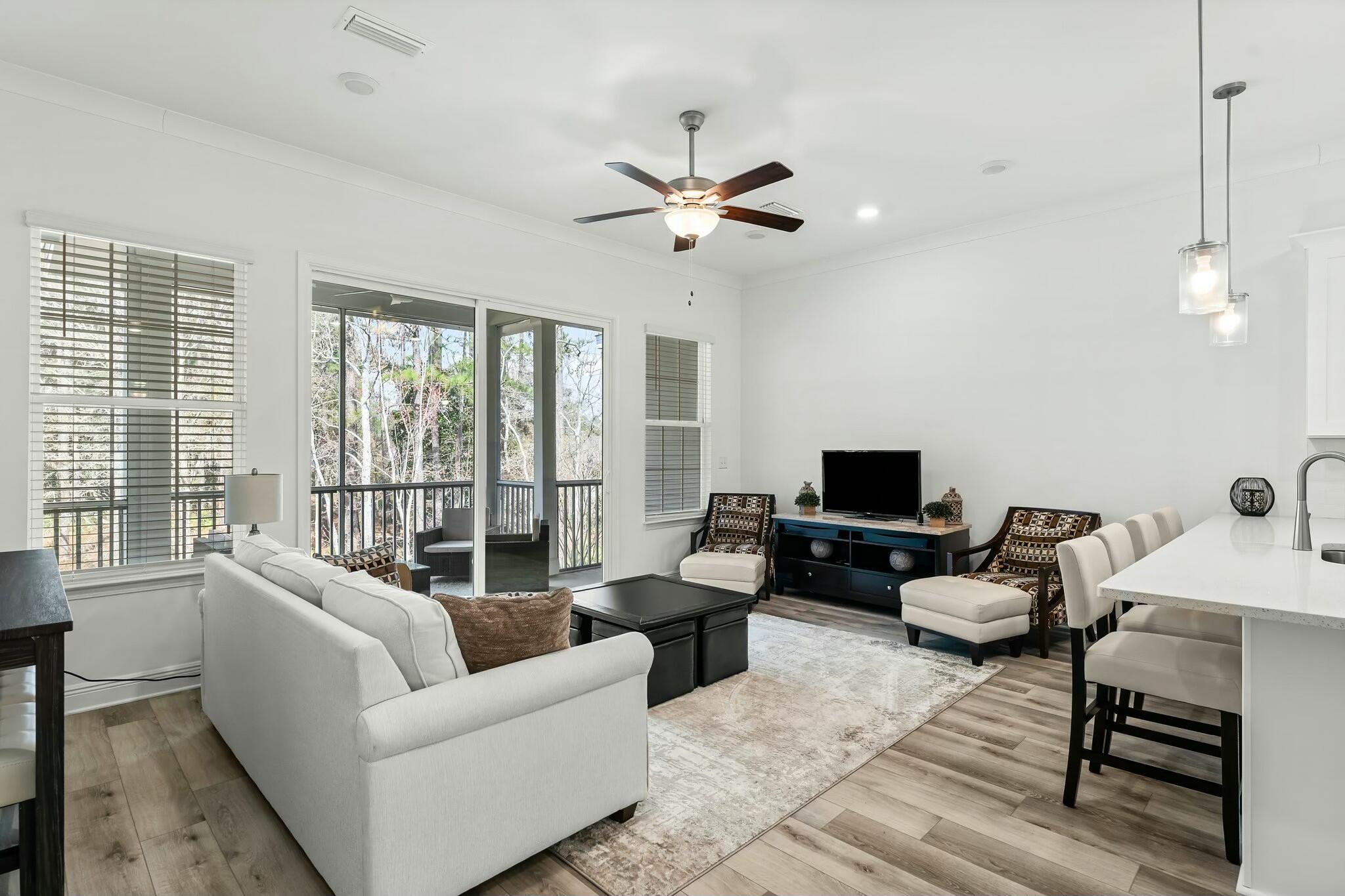 22 Kara Lake Drive Santa Rosa Beach, FL 32459 - Photo 12 of 44 a living room with furniture ceiling fan and a window